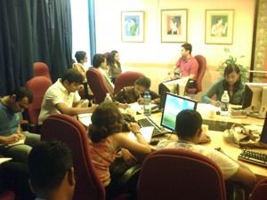 Participants conducting a Stakeholder Interview during Design Incubator's Weekend Workshop on User Requirements Engineering and UI Architecture, June 08